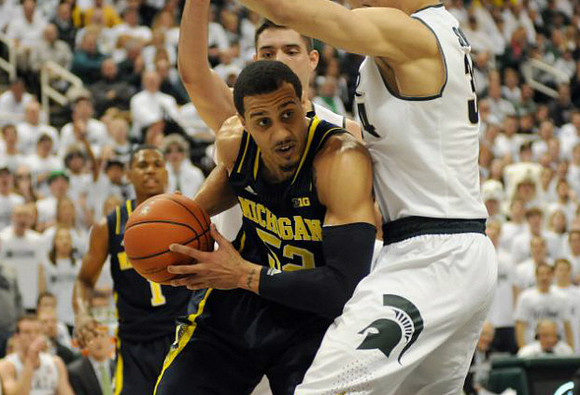Glenn Robinson III (1) and Jordan Morgan (52)