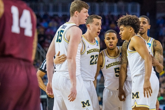 Jon Teske (15), Duncan Robinson (22), Jaaron Simmons (5), Jordan Poole (2), and Charles Matthews (1)