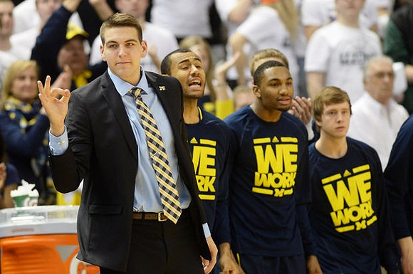 Mitch McGary (4), Jon Horford (15), Zak Irvin (21), and Spike Albrecht (2)
