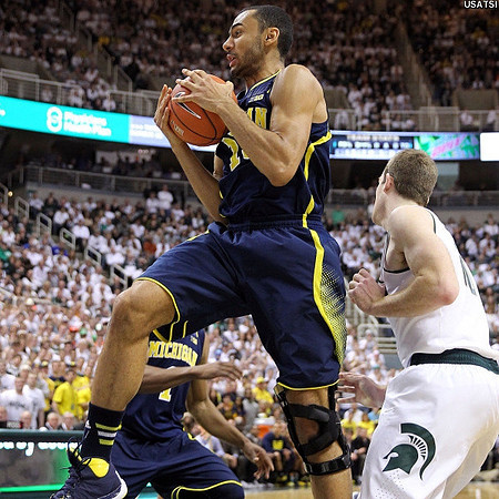 Glenn Robinson III (1) and Jon Horford (15)