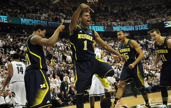 Derrick Walton Jr. (10), Glenn Robinson III (1), Jon Horford (15), and Nik Stauskas (11)
