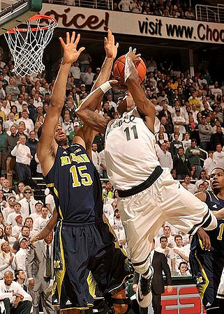 Jon Horford (15) and Glenn Robinson III (1)