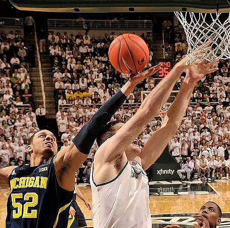 Jordan Morgan (52) and Glenn Robinson III (1)