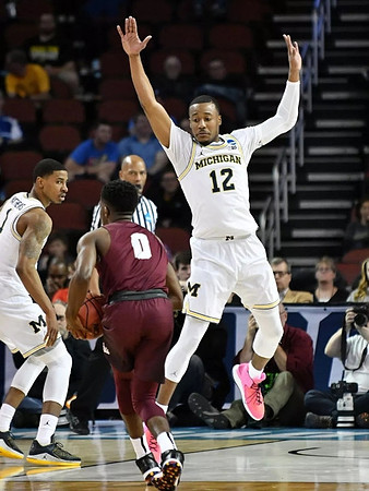 Charles Matthews (1) and Muhammad-Ali Abdur-Rahkman (12)