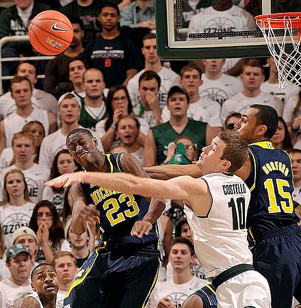Caris LeVert (23) and Jon Horford (15)