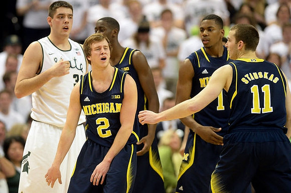 Spike Albrecht (2), Caris LeVert (23), Glenn Robinson III (1), and Nik Stauskas (11)