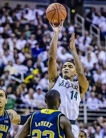 Jordan Morgan (52) and Caris LeVert (23)