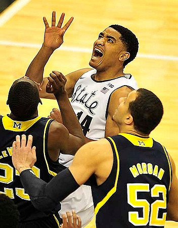 Caris LeVert (23) and Jordan Morgan (52)