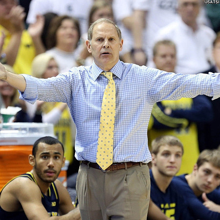 Jon Horford (15), John Beilein, Max Bielfeldt (44), and Mark Donnal (34)