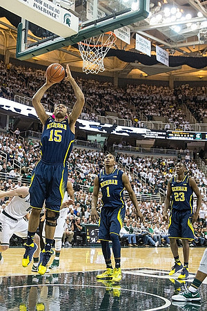 Jon Horford (15), Glenn Robinson III (1), and Caris LeVert (23)