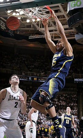 Jon Horford (15) and Nik Stauskas (11)