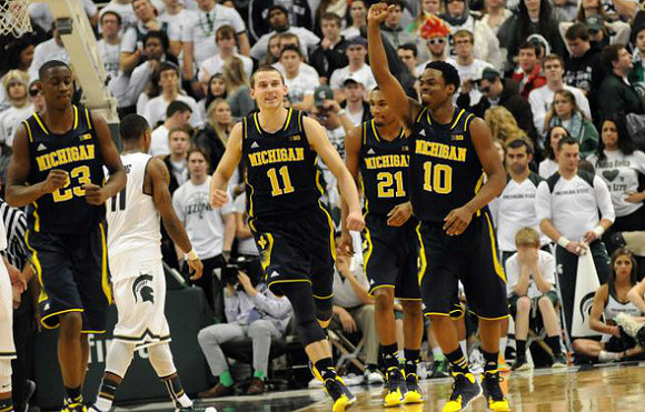 Caris LeVert (23), Nik Stauskas (11), Zak Irvin (21), and Derrick Walton Jr. (10)