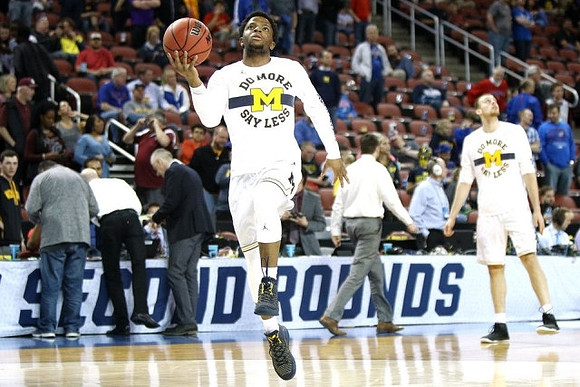 Zavier Simpson (3) and Austin Davis (51)