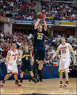 Evan Smotrycz (23) and Zack Novak (0)