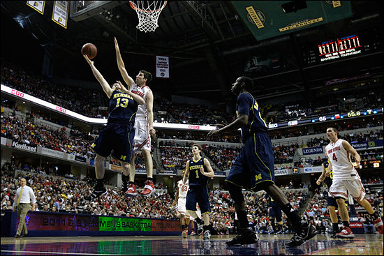 John Beilein, Matt Vogrich (13), Stu Douglass (1), and Tim Hardaway Jr. (10)