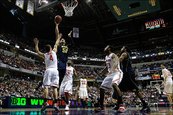 Jordan Morgan (52) and Darius Morris (4)