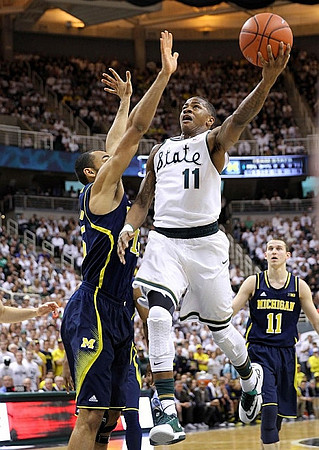 Jon Horford (15) and Nik Stauskas (11)