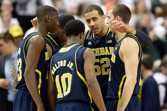 Caris LeVert (23), Derrick Walton Jr. (10), Glenn Robinson III (1), Jordan Morgan (52), and Nik Stauskas (11)