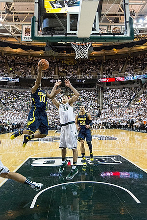 Derrick Walton Jr. (10) and Jordan Morgan (52)