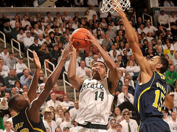 Caris LeVert (23) and Jon Horford (15)