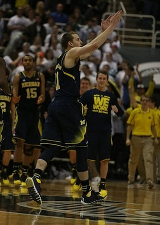 Jon Horford (15), Nik Stauskas (11), and Andrew Dakich (5)