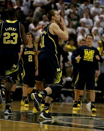 Caris LeVert (23), Spike Albrecht (2), Nik Stauskas (11), and Andrew Dakich (5)