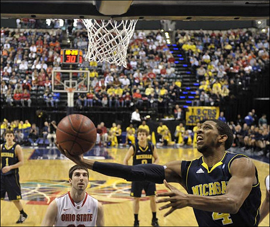 Stu Douglass (1), Zack Novak (0), and Darius Morris (4)