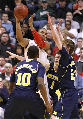 Tim Hardaway Jr. (10), Evan Smotrycz (23), and Stu Douglass (1)