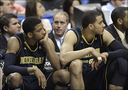 Darius Morris (4), Jordan Morgan (52), and LaVall Jordan