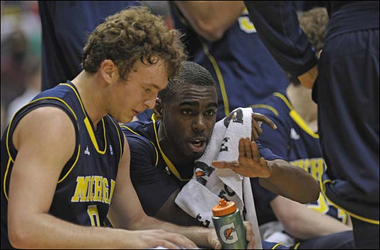 Zack Novak (0) and Tim Hardaway Jr. (10)