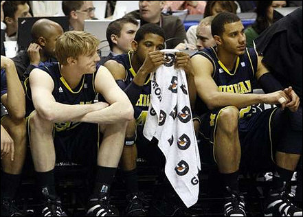 Blake McLimans (22), Darius Morris (4), and Jordan Morgan (52)