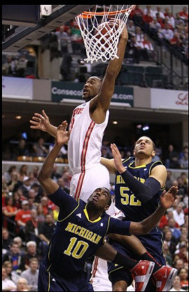 Tim Hardaway Jr. (10) and Jordan Morgan (52)