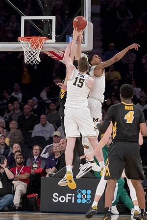 Jon Teske (15) and Charles Matthews (1)