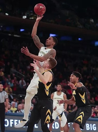 Charles Matthews (1) and Zavier Simpson (3)