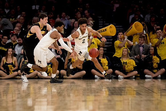 Zavier Simpson (3) and Jordan Poole (2)