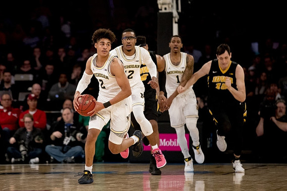 Jordan Poole (2), Muhammad-Ali Abdur-Rahkman (12), and Charles Matthews (1)