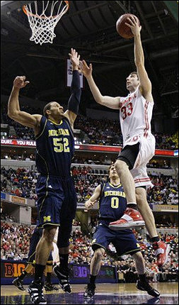Jordan Morgan (52) and Zack Novak (0)
