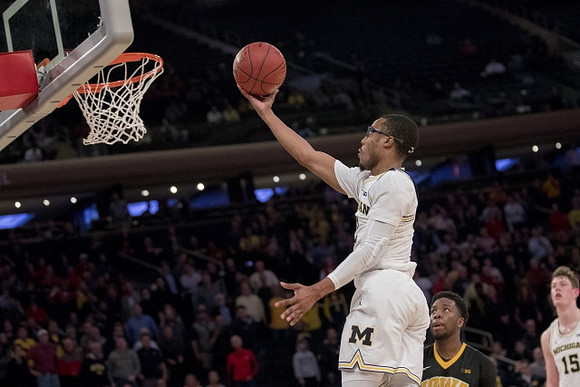 Muhammad-Ali Abdur-Rahkman (12) and Jon Teske (15)