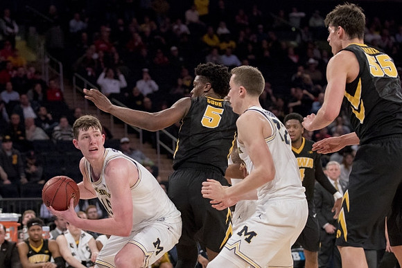 Jon Teske (15) and Duncan Robinson (22)