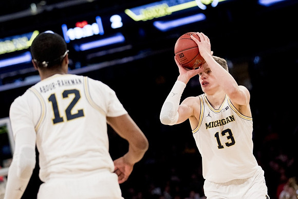 Muhammad-Ali Abdur-Rahkman (12) and Moritz Wagner (13)