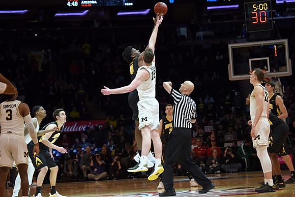 Zavier Simpson (3), Charles Matthews (1), Jon Teske (15), and Duncan Robinson (22)