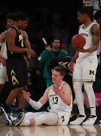 Jordan Poole (2), Moritz Wagner (13), and Charles Matthews (1)