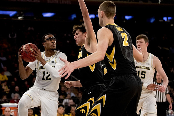 Muhammad-Ali Abdur-Rahkman (12) and Jon Teske (15)