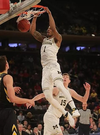 Charles Matthews (1) and Jon Teske (15)