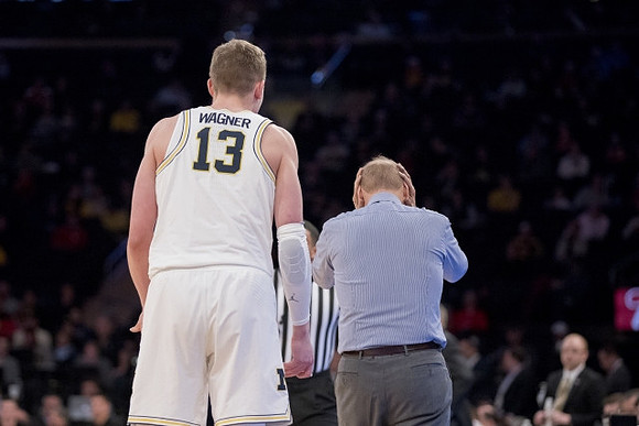 Moritz Wagner (13) and John Beilein
