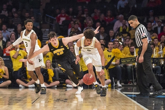 Zavier Simpson (3) and Jordan Poole (2)