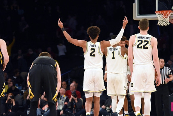 Jordan Poole (2), Charles Matthews (1), and Duncan Robinson (22)