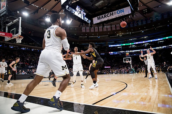 Isaiah Livers (4), Zavier Simpson (3), Charles Matthews (1), and Moritz Wagner (13)