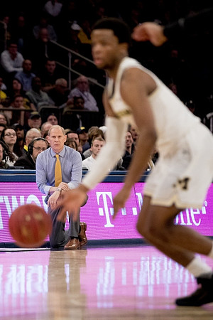 Zavier Simpson (3) and John Beilein