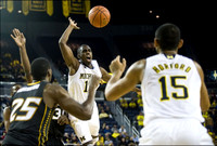 Tim Hardaway Jr. (10) and Jon Horford (15)